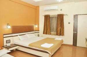 Foto sihtkohas Shirdi asuva majutusasutuse Hotel Shri Shiv Sai galeriist +15 fotot