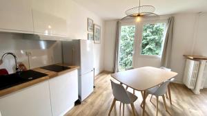 Køkken eller tekøkken på T2 refait à neuf Quartier Chantenay avec Parking + 8 billeder