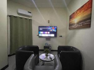 TV/trung tâm giải trí tại Hotel Divines Graces Residence Inn +14 ảnh