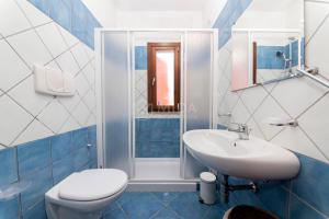 Et badeværelse på Orange Sun - Chiusurelle Village