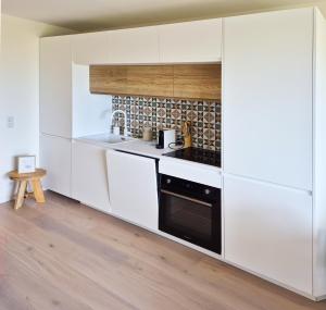 Nhà bếp/bếp nhỏ tại Le Verdi - Les Gîtes de la Côte d'Amour +8 ảnh