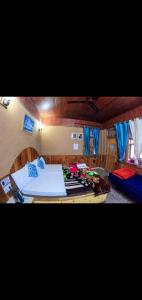 Φωτογραφία από το άλμπουμ του Tirthan Nature Lap Homestay σε Gushaini