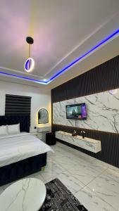 Giường trong phòng chung tại TW-Residence