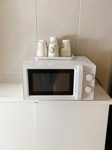 Kuchyň nebo kuchyňský kout v ubytování Stay Early Mansion 광명사거리역 고척돔