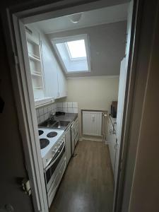 Kuchyň nebo kuchyňský kout v ubytování Uddeholm Apartment + 3 fotografie