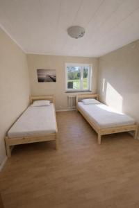 Postel nebo postele na pokoji v ubytování Uddeholm Apartment