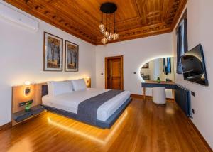 TV a/nebo společenská místnost v ubytování Gold plus apartment + 24 fotografií