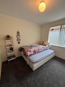 En eller flere senge i et værelse på The boathouse - 1 or 2 houses side by side