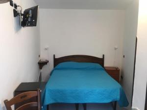 Кровать или кровати в номере Azzurromare Residence