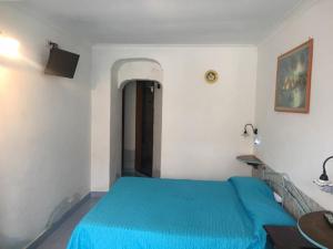 Кровать или кровати в номере Azzurromare Residence