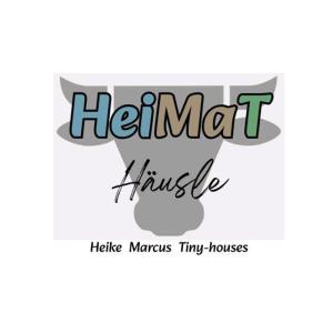 ein Schild mit der Aufschrift „Einsiedlerdreieck“ und einem Vogel in der Unterkunft HeiMaT Häusle - Heike Marcus Tiny-houses in Cleebronn + 15 Fotos