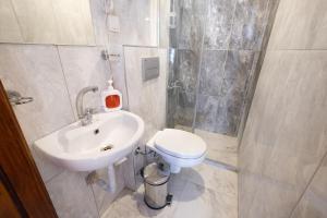 Koupelna v ubytování Gold plus apartment