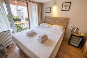 Postel nebo postele na pokoji v ubytování Gold plus apartment