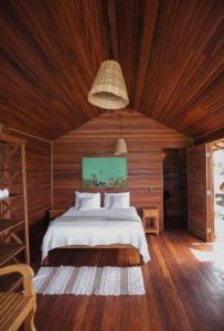 En eller flere senge i et værelse på Canto do Mar Caraiva