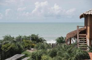 a view of the ocean from a resort at Canto do Mar Caraiva in Caraíva