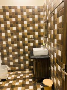 Koupelna v ubytování Hotel Woodcrest Zirakpur