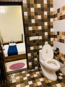 Koupelna v ubytování Hotel Woodcrest Zirakpur