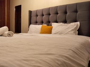 Postel nebo postele na pokoji v ubytování Cozyhub