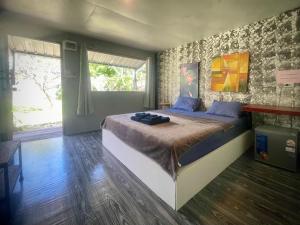 Ένα ή περισσότερα κρεβάτια σε δωμάτιο στο Ozone Beach House +50 φωτογραφίες