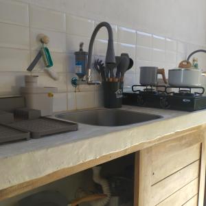 Kuchyň nebo kuchyňský kout v ubytování Casa Tatuí