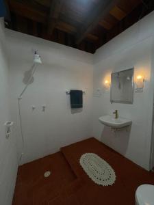 Koupelna v ubytování Casa de Praia em Pontal do Sul