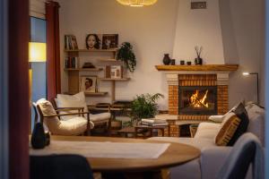 Et opholdsområde på Villa Crossdeira - A Wellness Retreat