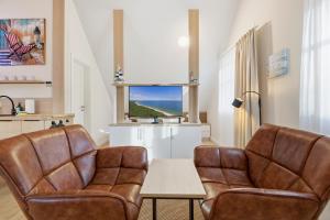 Khu vực ghế ngồi tại Dünenhaus Ückeritz UnserUsedomDe FeWo ca23qm mit Parkplatz direkt am Strand 11I4 +14 ảnh