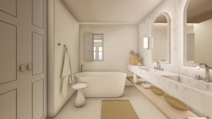 ein weißes Badezimmer mit einer großen Badewanne und einem Waschbecken in der Unterkunft Patmos Aktis, a Luxury Collection Resort & Spa, Greece in Patmos + 106 Fotos