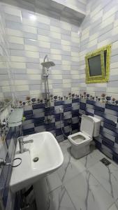 TV a/nebo společenská místnost v ubytování Anas Nubian Geust House