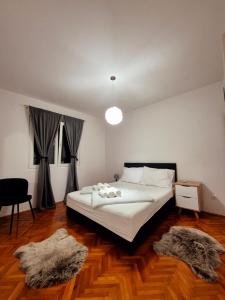 En eller flere senge i et værelse på Katarina