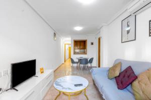 Et tv og/eller underholdning på Homely Apartments Alcatri