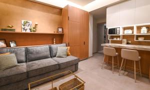 Et opholdsområde på Elvira's Apartments