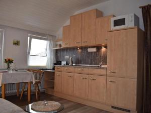 Köök või kööginurk majutusasutuses Feriendomizil Wattwurm Paul