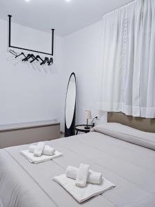 Postel nebo postele na pokoji v ubytování Dimora del Centro