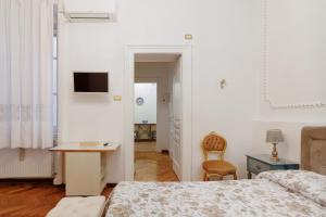 Et tv og/eller underholdning på Elegante appartamento d'epoca nel centro di Trieste