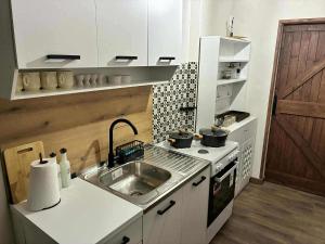 Køkken eller tekøkken på Bohemian Rhapsody + 7 billeder