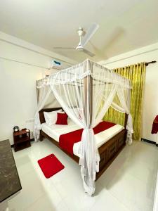 Giường trong phòng chung tại Seagate Villa