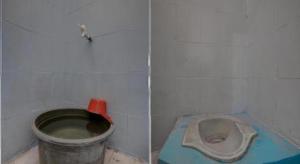 Un baño sucio con un inodoro en una habitación. en Hotel O Sunyoto Homestay Syariah, en Banjarsalero