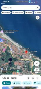 a cell phone screen with a map on it at Casa de Praia in Caucaia +7 photos