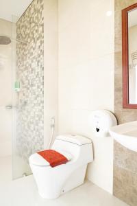 Koupelna v ubytování Multi 88 Syariah