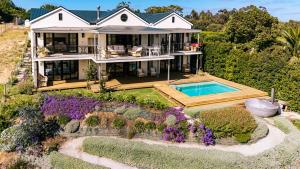 an aerial view of a house with a swimming pool at Stanford Riverside Retreat - Hotub & Pool in Stanford