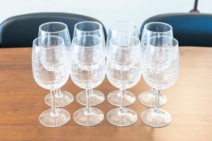 a group of wine glasses sitting on a table at AMP FLAT MOMOCHi in Fukuoka