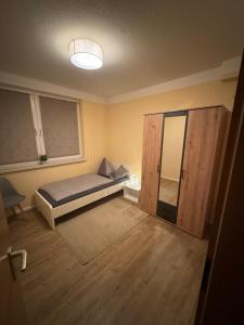 Postel nebo postele na pokoji v ubytování Cottbus Virchowstraße Zentrum