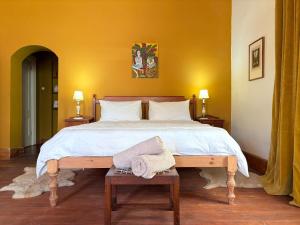 Ένα ή περισσότερα κρεβάτια σε δωμάτιο στο Curious Prince