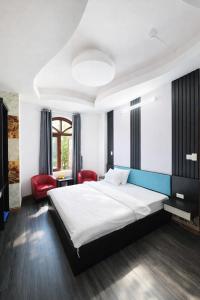 En eller flere senge i et værelse på Hưng Phú 3 Hotel