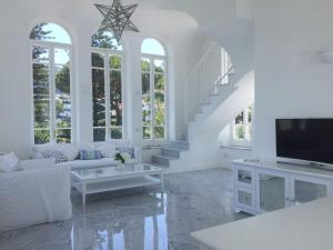 Et tv og/eller underholdning på Villa Selenè by My Villa Collection + 39 billeder