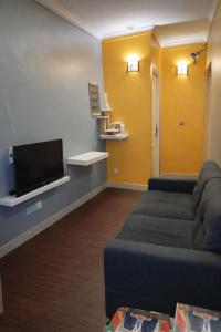 TV a/nebo společenská místnost v ubytování Male City Stay