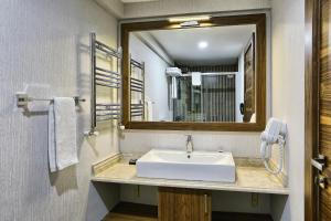 Et badeværelse på City Hotel Residence