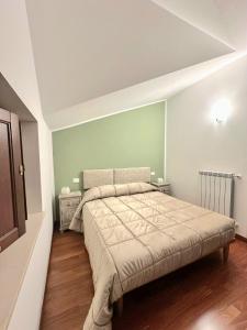 Giường trong phòng chung tại Le Tre Civette +5 ảnh