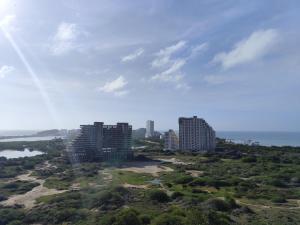 an aerial view of a city with tall buildings at Apartment on Margarita Island edif Lagunablanca Apto 1201 in Porlamar